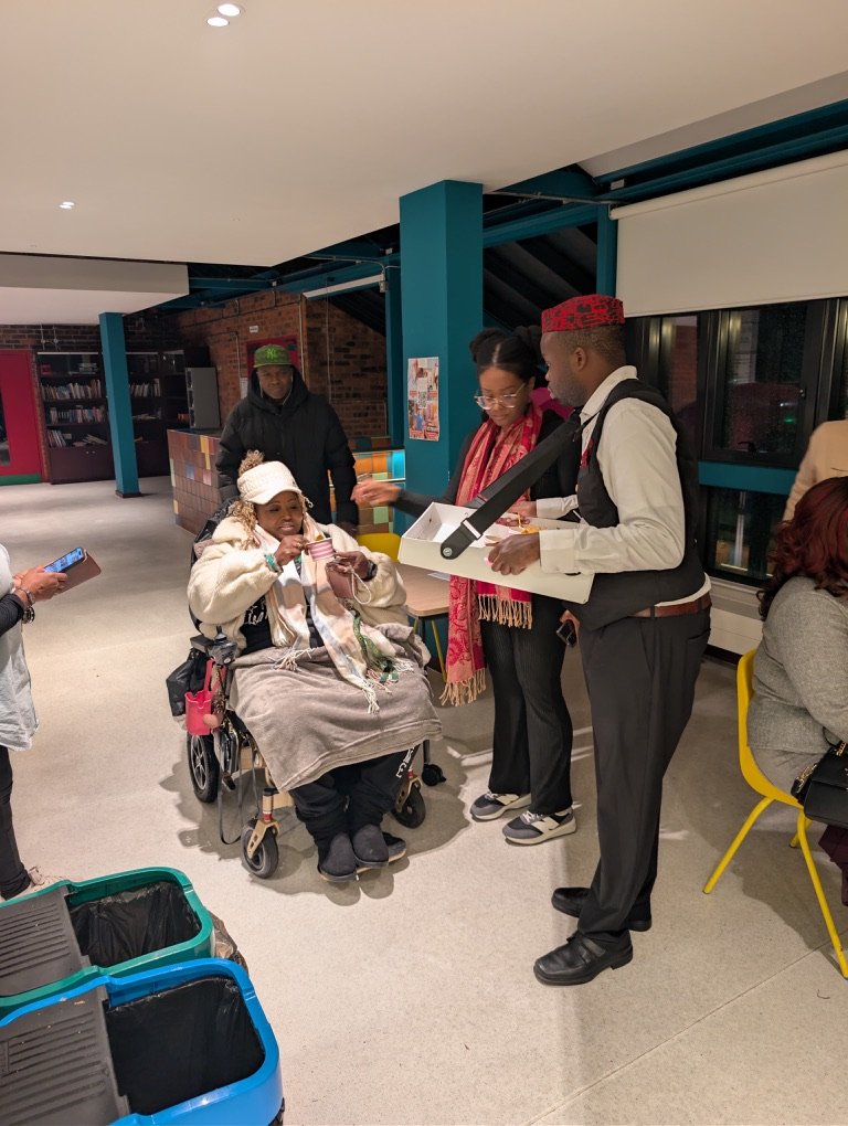 Learner buying food as part of catering training